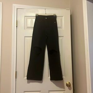 Women’s black ripped jeans